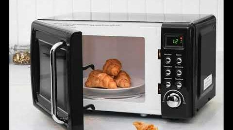 Costway (EP23853BK) 0.7 cu. ft. Retro Countertop Microwave Oven - COSTWAY Retro Countertop Microwave Oven, 0.7Cu.ft, 700-Watt