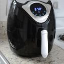 Uber Appliance 3.7 Quart 1300 Watts Programmable Touch Screen Air Fryer - 7 Pre-set functions - non-stick Dishwasher safe - 30 minute Auto Shut off - recipe book included - Black